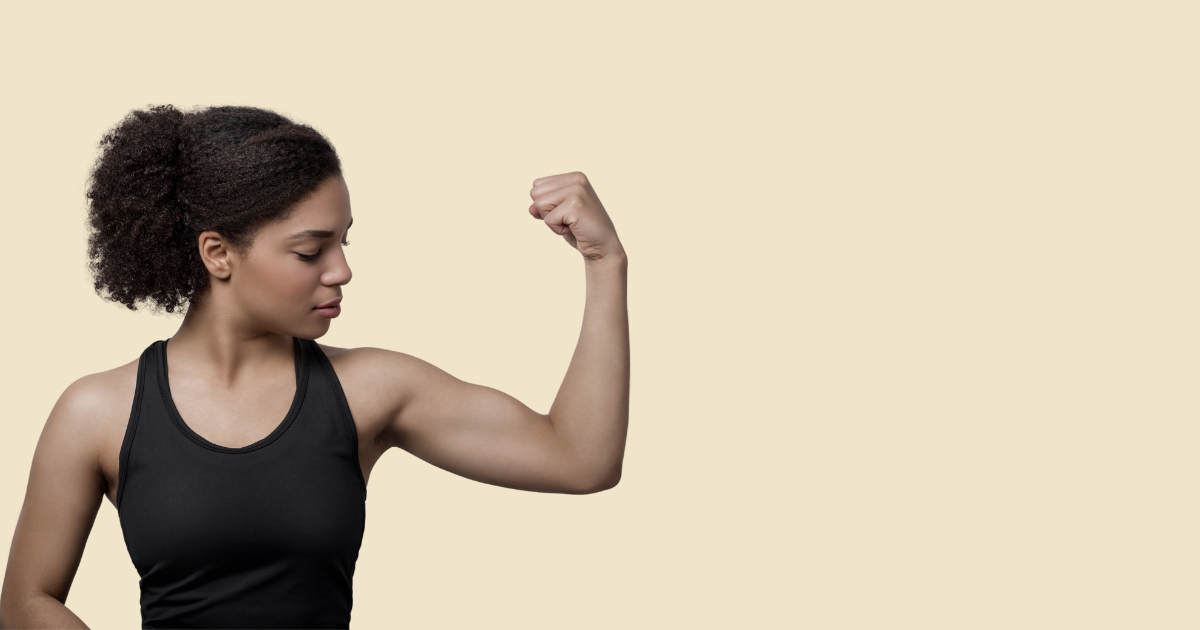 A woman showing off her muscular arms.
